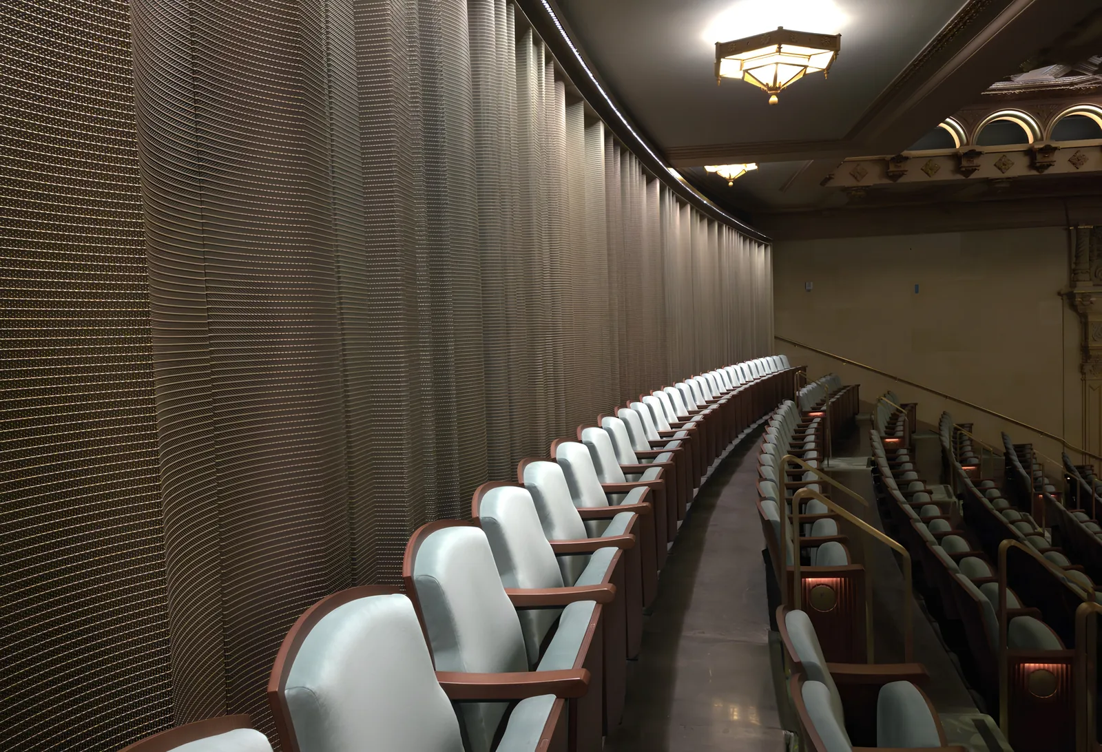 Auditorium with acoustic wall lining