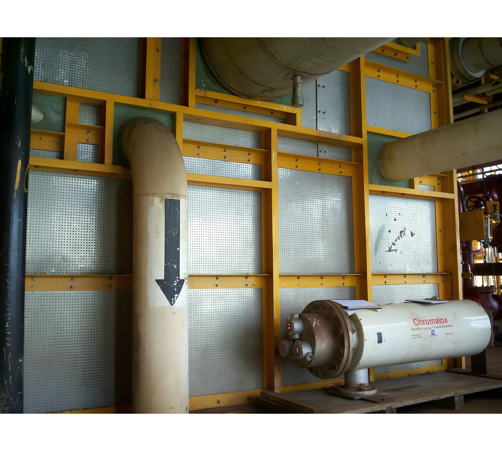 Fire partition with sealed pipe openings